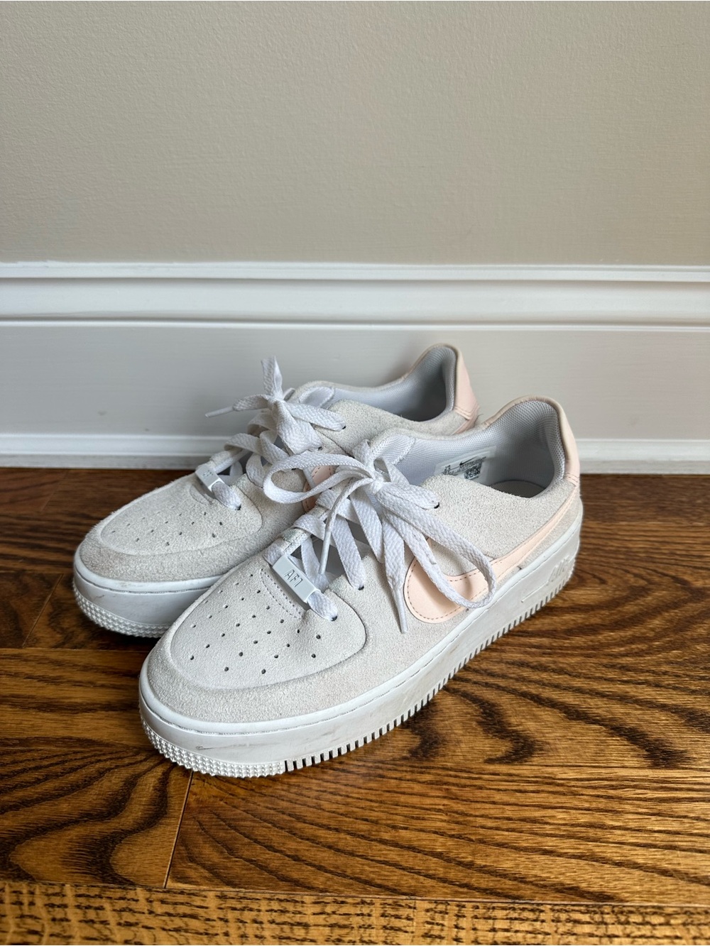Nike Women’s Low-Top Suede Sneakers in White and Light Pink